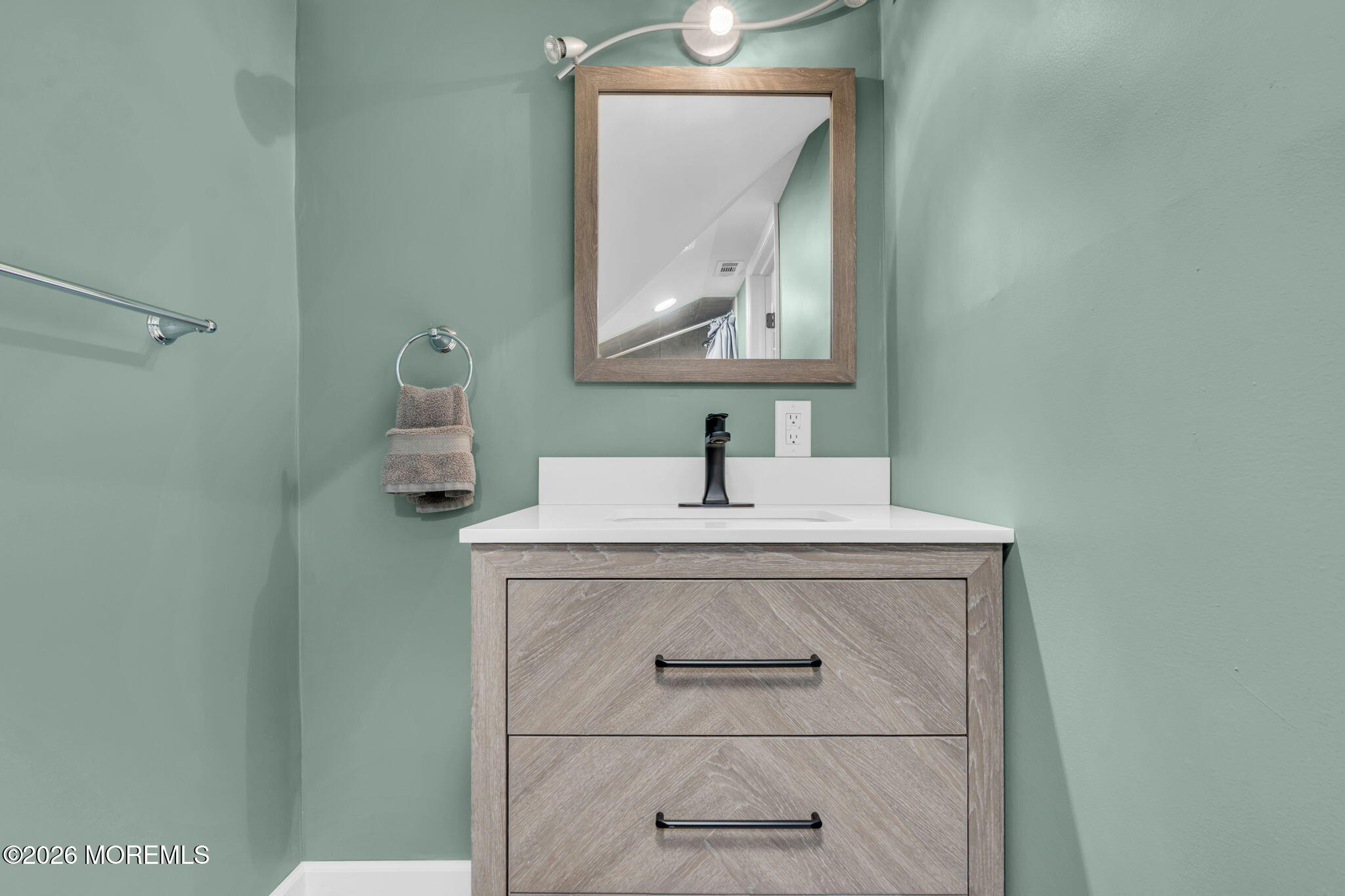 181 Locust Avenue Howell, NJ 07731 - Photo 44 of 66 a bathroom with a sink a mirror and vanity