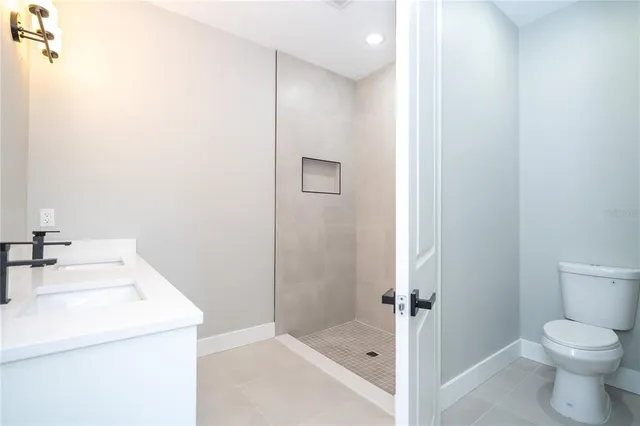 a view of a swimming pool with a lounge chairs