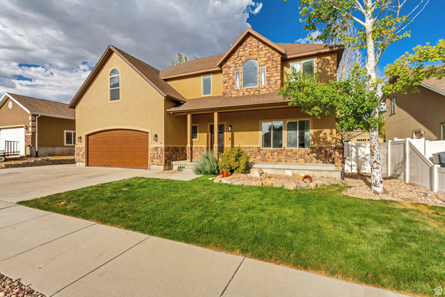 1585 South 910 West Payson, UT 84651 - Photo 2 of 32 Two-story stucco exterior with stone accents and a covered front porch