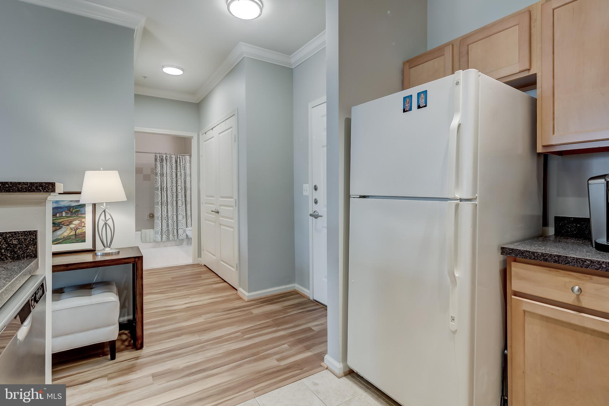 12000 Market Street, Unit 337 Reston, VA 20190 - Photo 17 of 74 Kitchen and Hallway to other Rooms