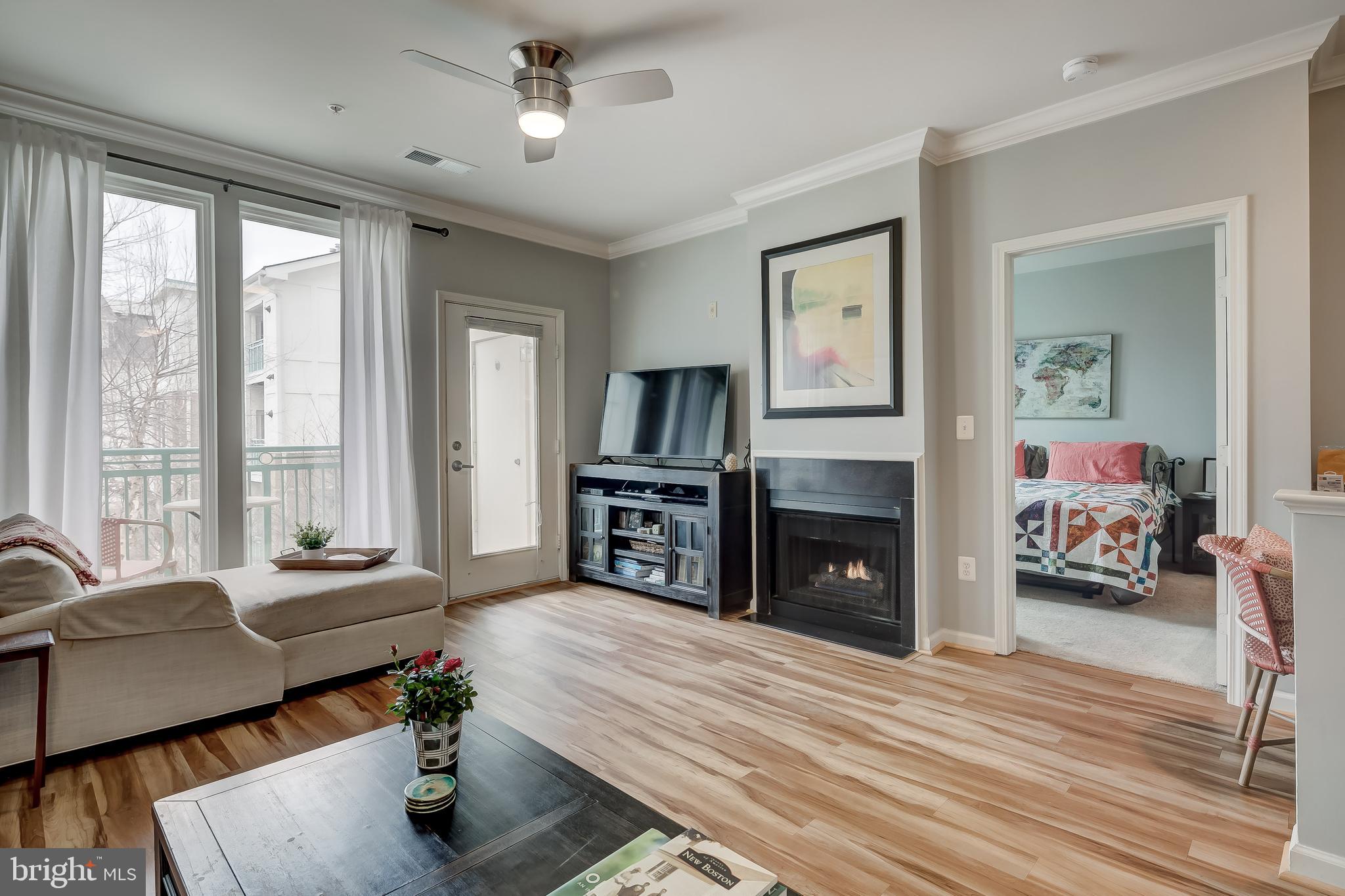 12000 Market Street, Unit 337 Reston, VA 20190 - Photo 18 of 74 Living Room