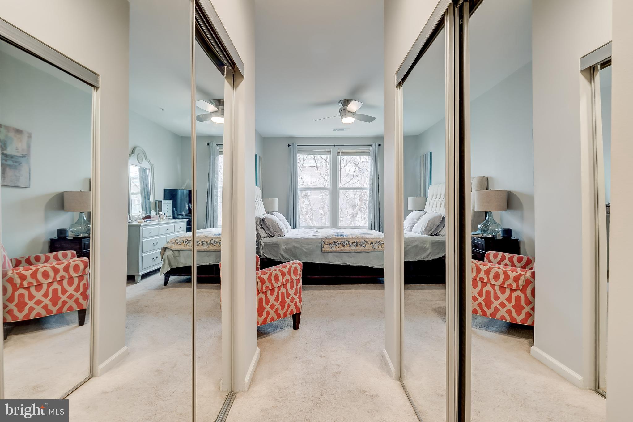 12000 Market Street, Unit 337 Reston, VA 20190 - Photo 36 of 74 Hallway in MBR with Closets on Both Sides