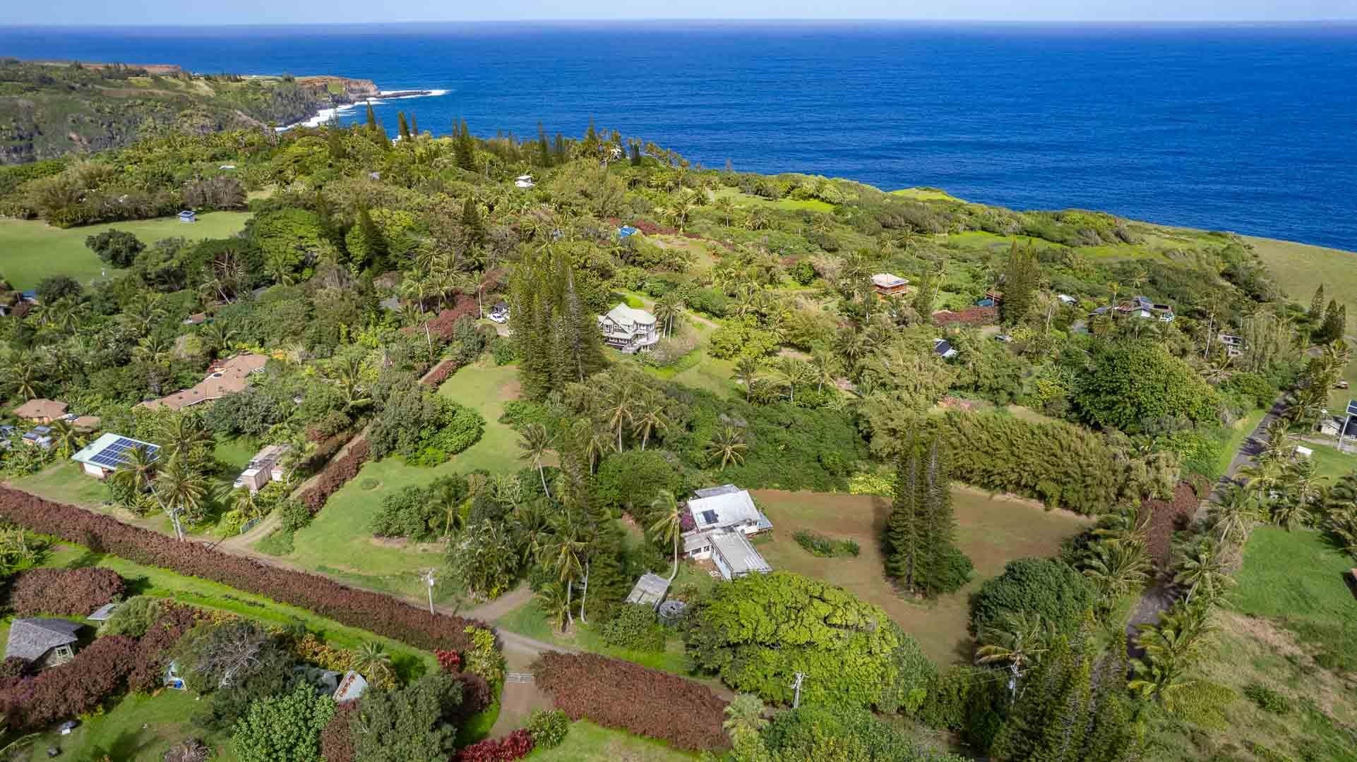 210 Door Of Faith Road Haiku, HI 96708 - Photo 18 of 44 a view of a lake with a mountain