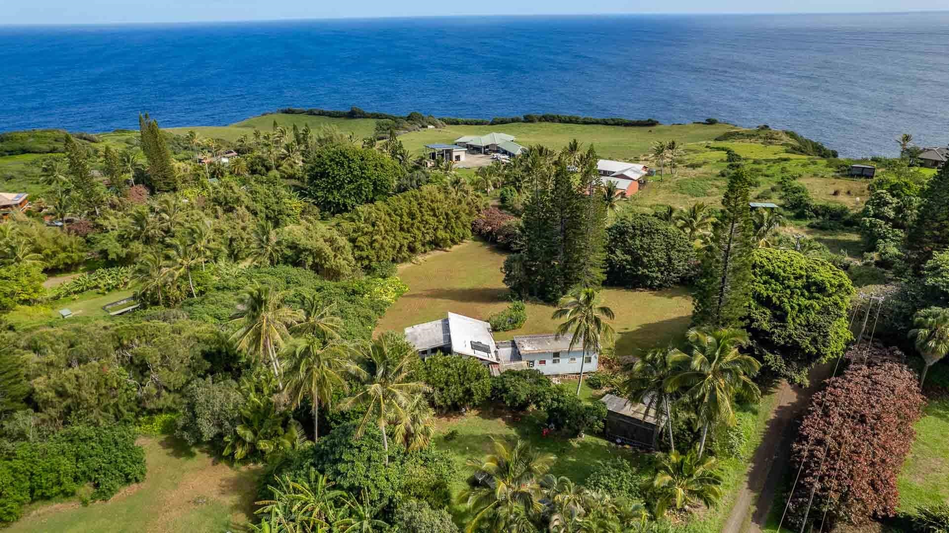 210 Door Of Faith Road Haiku, HI 96708 - Photo 21 of 44 a view of an outdoor space and a lake view