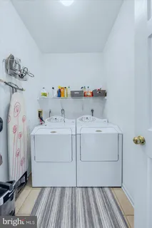 a utility room with a washer and dryer