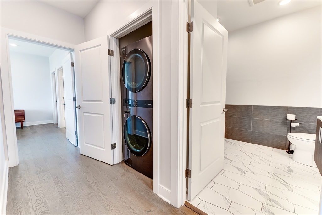 2 Cliveden Street, Unit 601E Quincy, MA 02169 - Photo 12 of 27 a view of a storage & utility room with a washer dryer