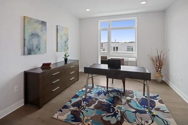 a room with furniture and a window