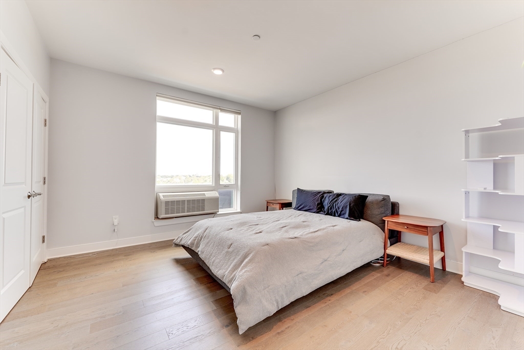 2 Cliveden Street, Unit 601E Quincy, MA 02169 - Photo 22 of 27 a bedroom with a bed and a window