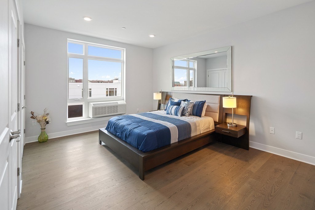 2 Cliveden Street, Unit 601E Quincy, MA 02169 - Photo 23 of 27 a bedroom with a large bed and a window