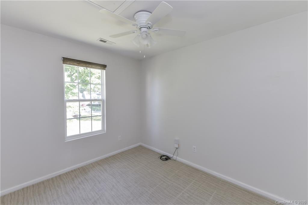 3906 Harris Houston Road Charlotte, NC 28262 - Photo 16 of 28 an empty room with a window