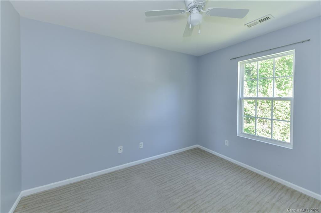 3906 Harris Houston Road Charlotte, NC 28262 - Photo 17 of 28 an empty room with a window