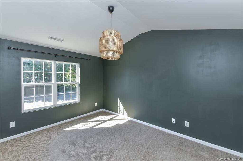 3906 Harris Houston Road Charlotte, NC 28262 - Photo 20 of 28 a view of an empty room with a window