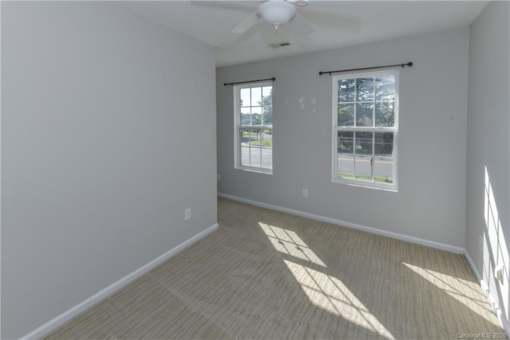 3906 Harris Houston Road Charlotte, NC 28262 - Photo 22 of 28 a view of an empty room with a window