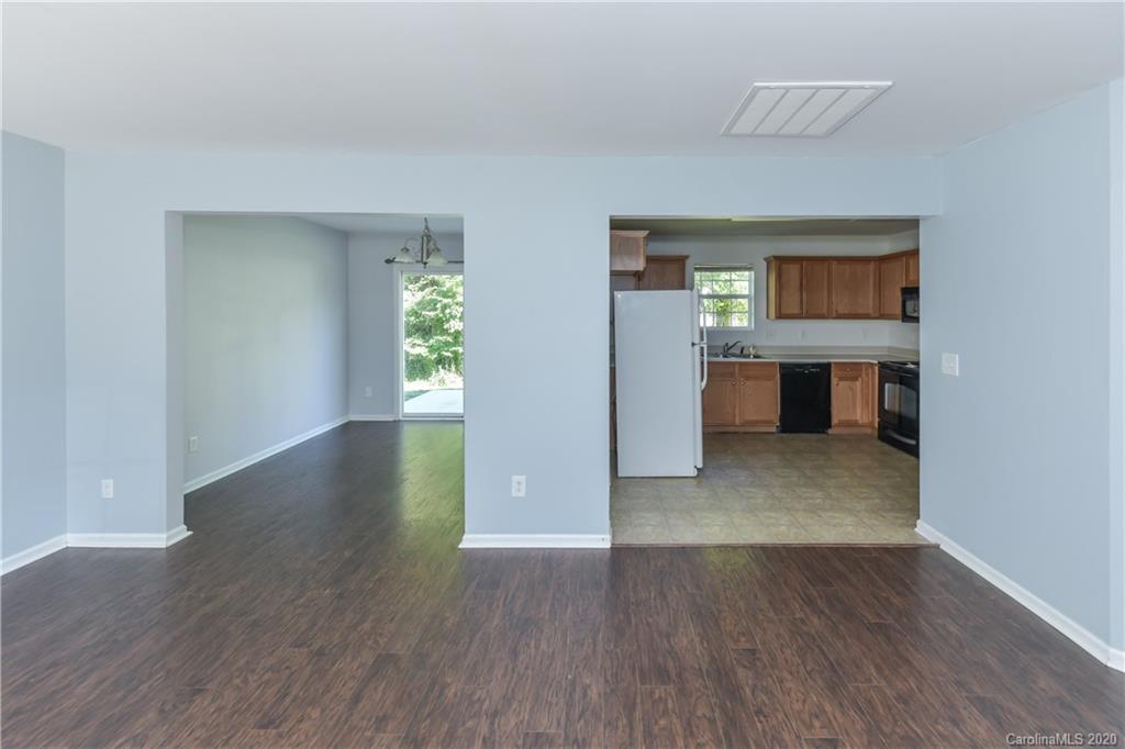 3906 Harris Houston Road Charlotte, NC 28262 - Photo 25 of 28 a view of a kitchen cabinets and wooden floor