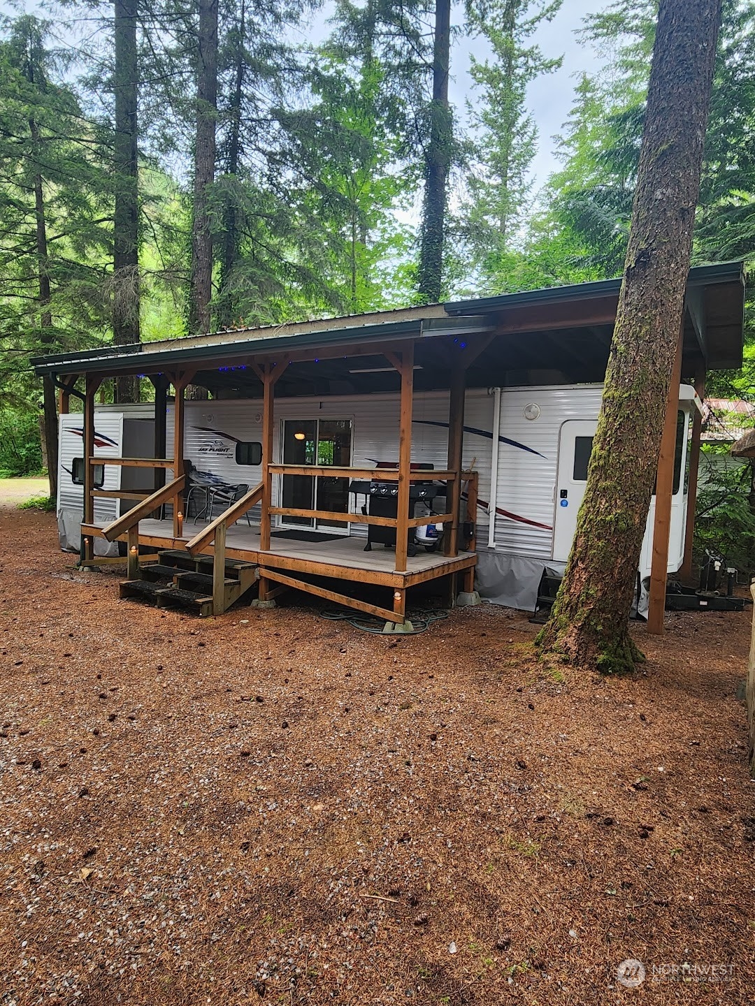 3003 Tower Road Maple Falls, WA 98266 - Photo 4 of 23 a house with trees in the background