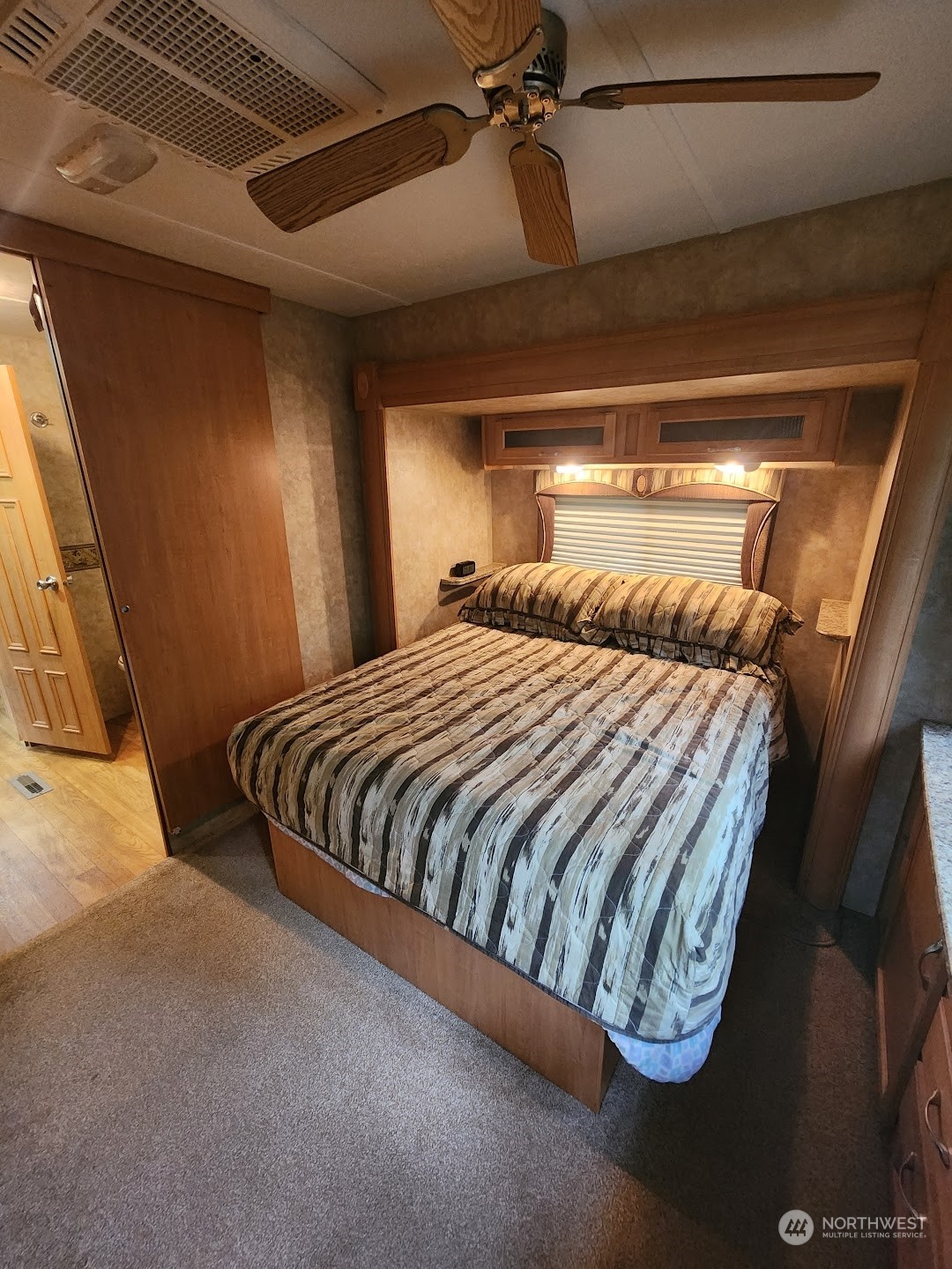 3003 Tower Road Maple Falls, WA 98266 - Photo 8 of 23 a bedroom with a bed and a walk in closet