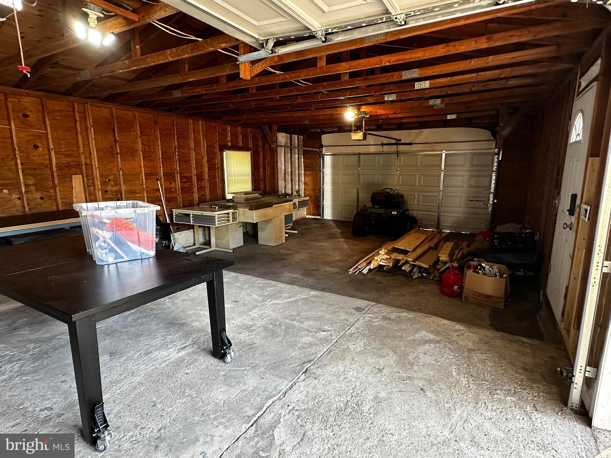 8318 Elvaton Road Millersville, MD 21108 - Photo 68 of 73 3 car garage with work area
