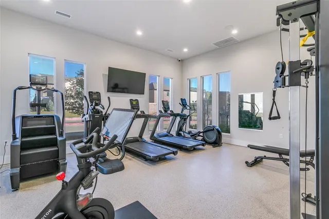 a view of a room with gym equipment
