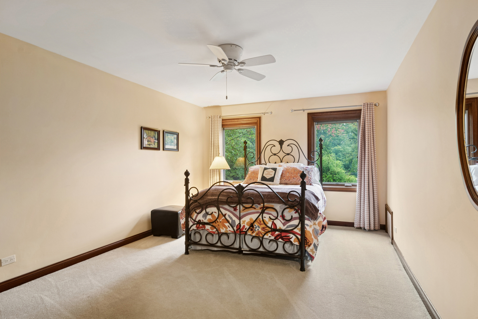 1987 Selkirk Court Inverness, IL 60010 - Photo 24 of 63 a bed sitting in a bedroom next to a window