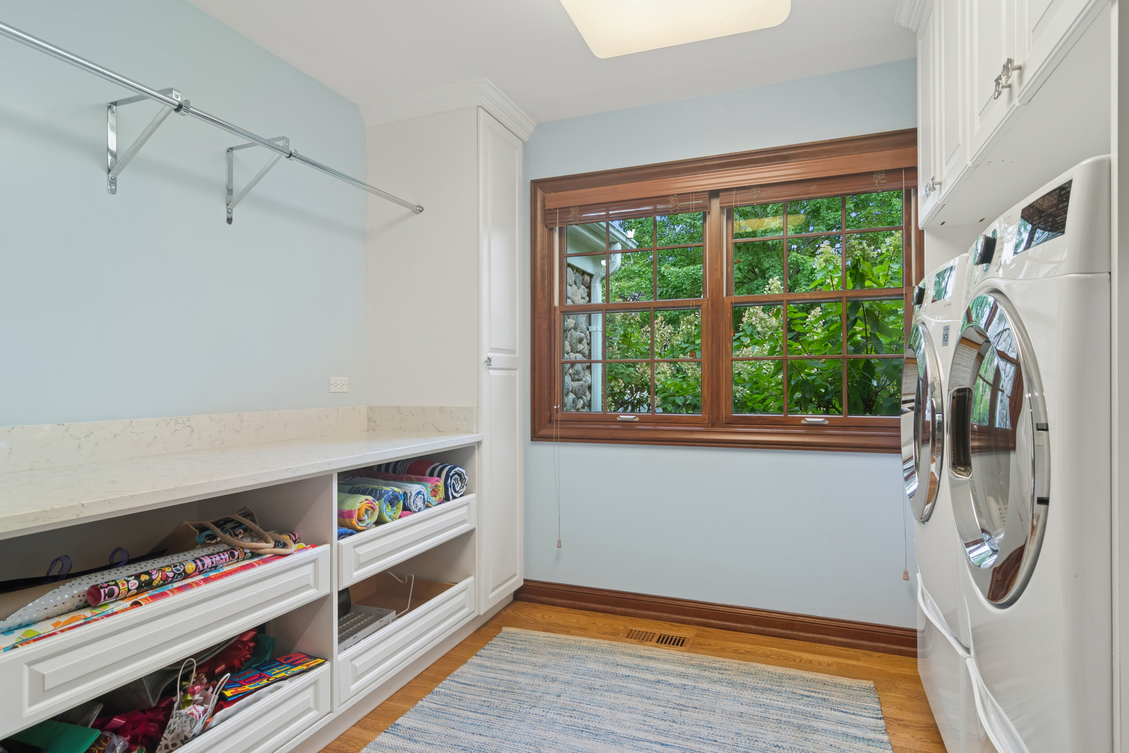 1987 Selkirk Court Inverness, IL 60010 - Photo 38 of 63 a view of walk in closet with clothes and shoes
