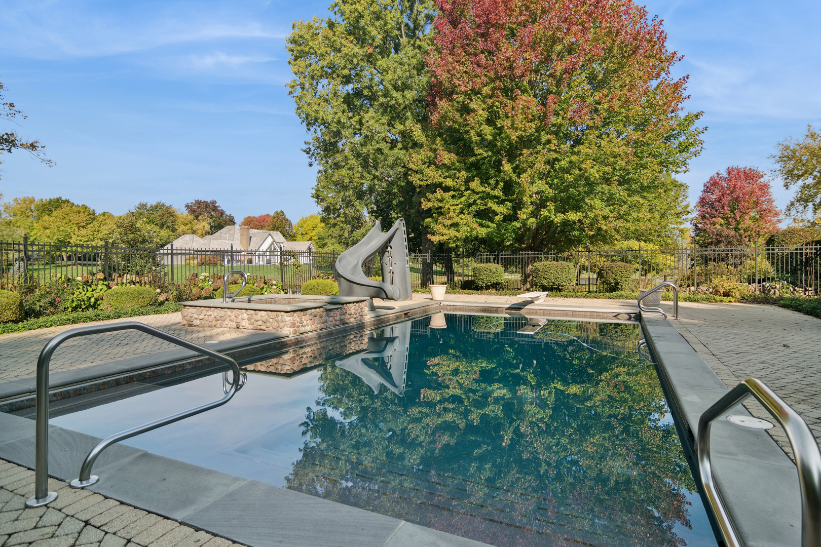 1987 Selkirk Court Inverness, IL 60010 - Photo 46 of 63 a view of a yard with a slide