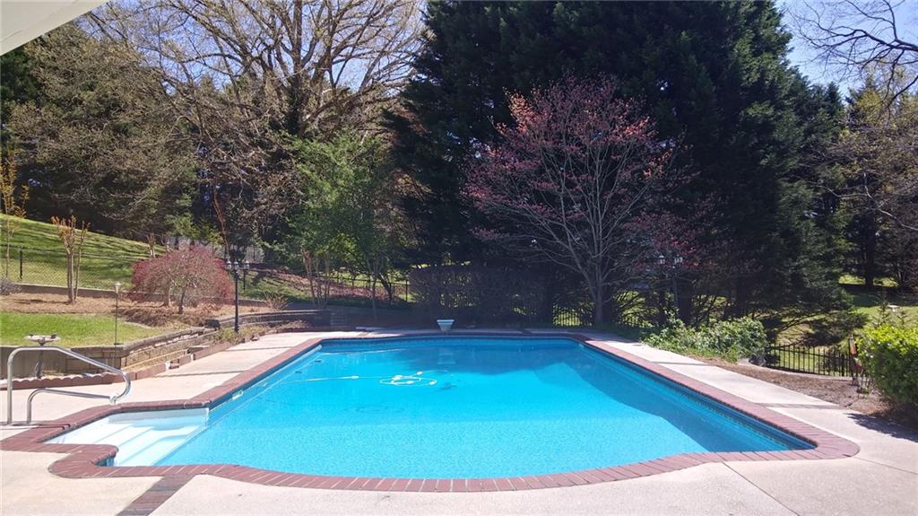 3415 South View Trail Gainesville, GA 30506 - Photo 3 of 65 a view of a swimming pool with an outdoor space