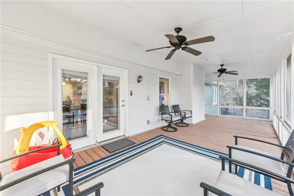 3415 South View Trail Gainesville, GA 30506 - Photo 32 of 65 a room with gym equipment and windows