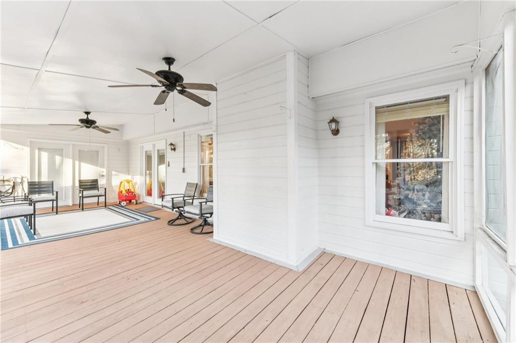 3415 South View Trail Gainesville, GA 30506 - Photo 33 of 65 an empty room with wooden floor and windows