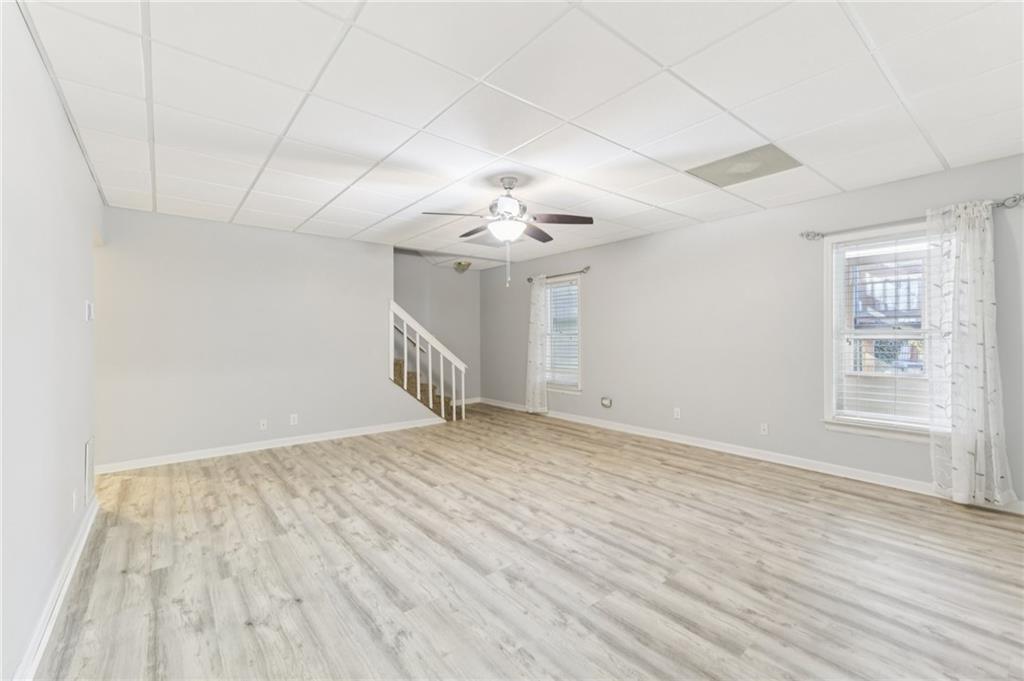 3415 South View Trail Gainesville, GA 30506 - Photo 36 of 65 wooden floor in an empty room with a window