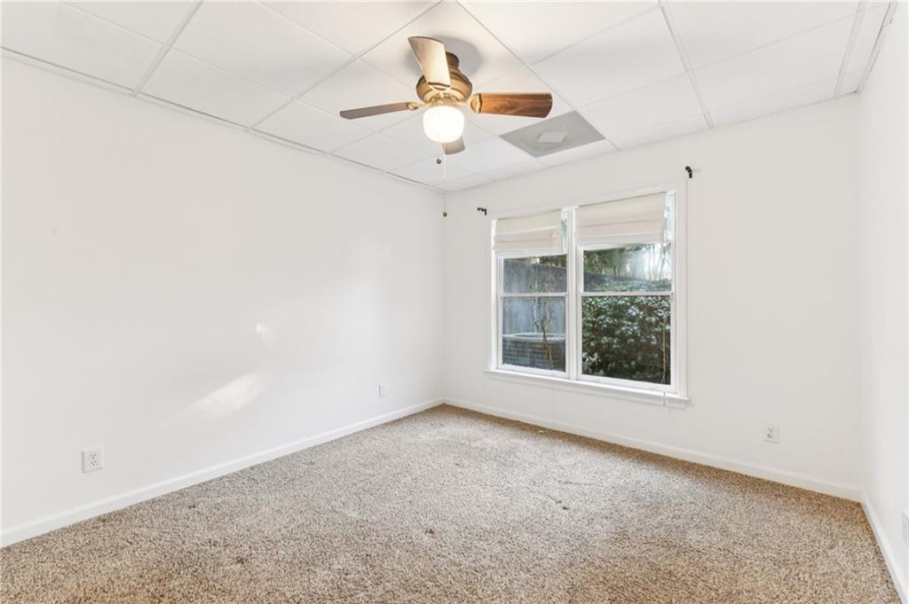 3415 South View Trail Gainesville, GA 30506 - Photo 38 of 65 an empty room with windows and fan