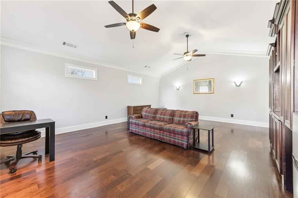 3415 South View Trail Gainesville, GA 30506 - Photo 51 of 65 a living room with furniture and a ceiling fan