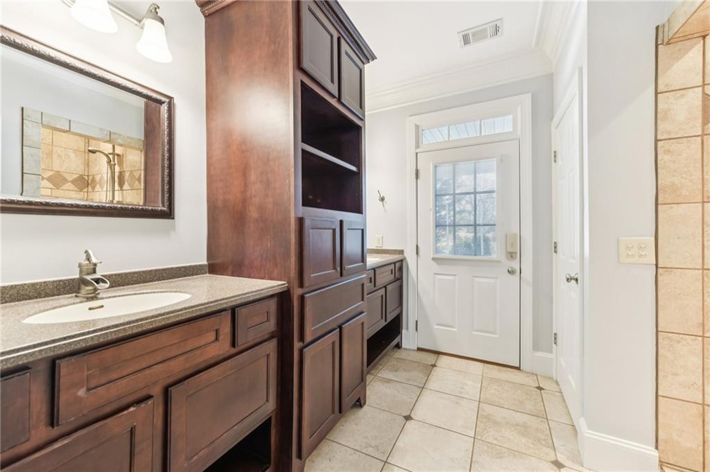 3415 South View Trail Gainesville, GA 30506 - Photo 52 of 65 a kitchen with stainless steel appliances granite countertop a sink and a refrigerator