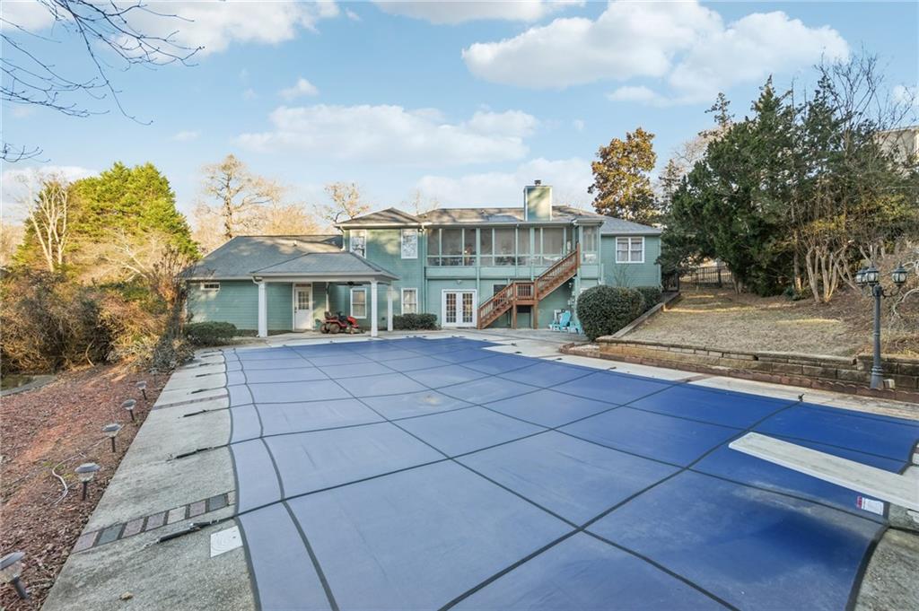 3415 South View Trail Gainesville, GA 30506 - Photo 58 of 65 a view of a white house with a yard