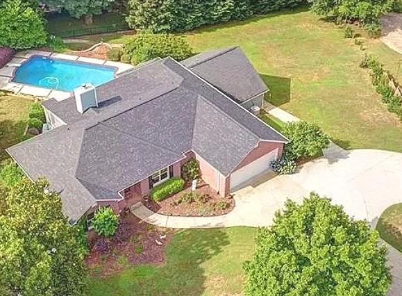 3415 South View Trail Gainesville, GA 30506 - Photo 62 of 65 a aerial view of a house with a yard and lake view