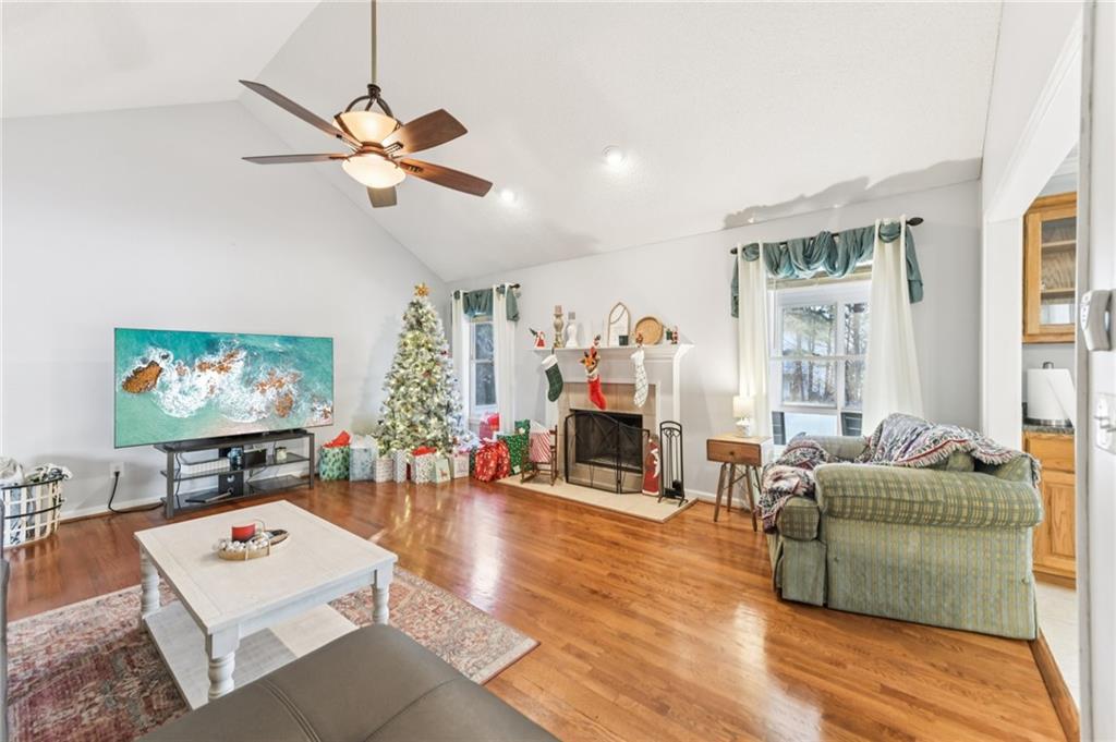 3415 South View Trail Gainesville, GA 30506 - Photo 8 of 65 a living room with furniture and a flat screen tv