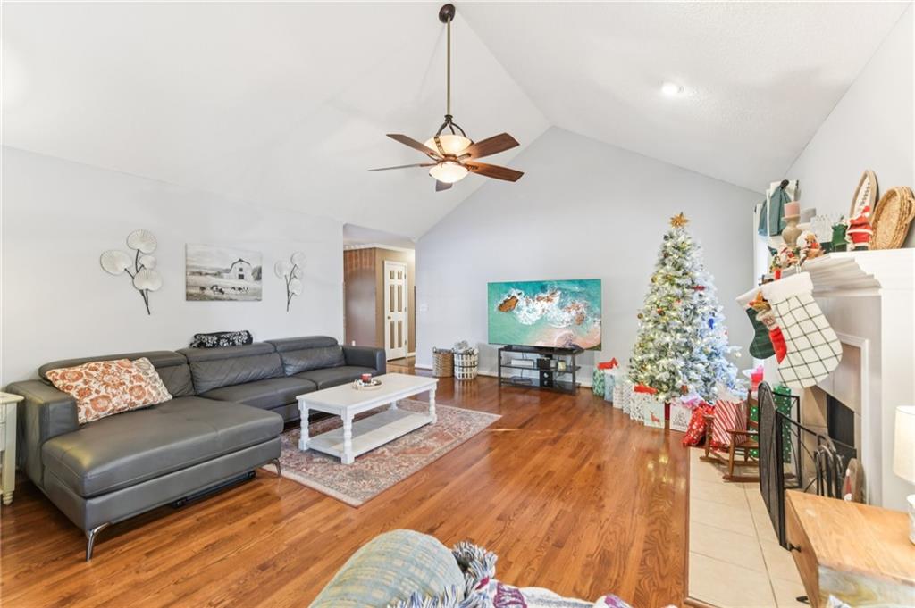 3415 South View Trail Gainesville, GA 30506 - Photo 9 of 65 a living room with furniture and a chandelier