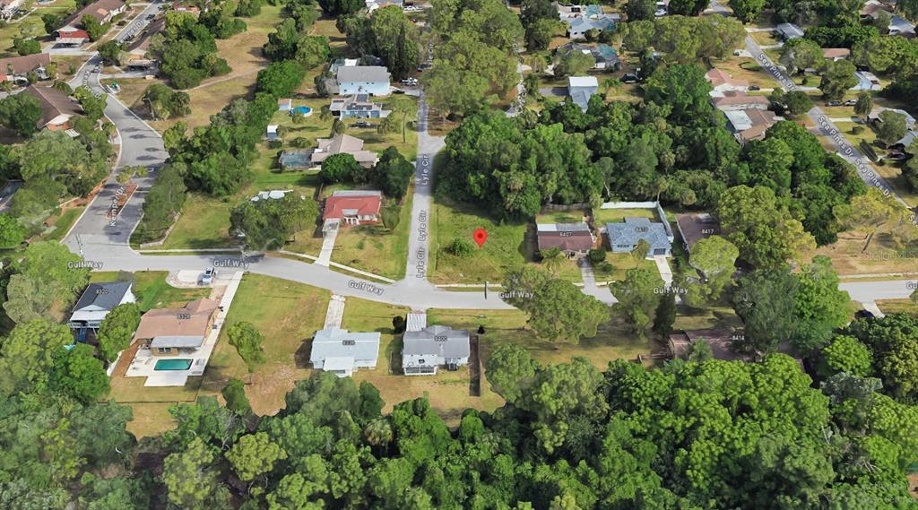 8501 Gulf Way Hudson, FL 34667 - Photo 10 of 10 an aerial view of residential house with outdoor space and swimming pool