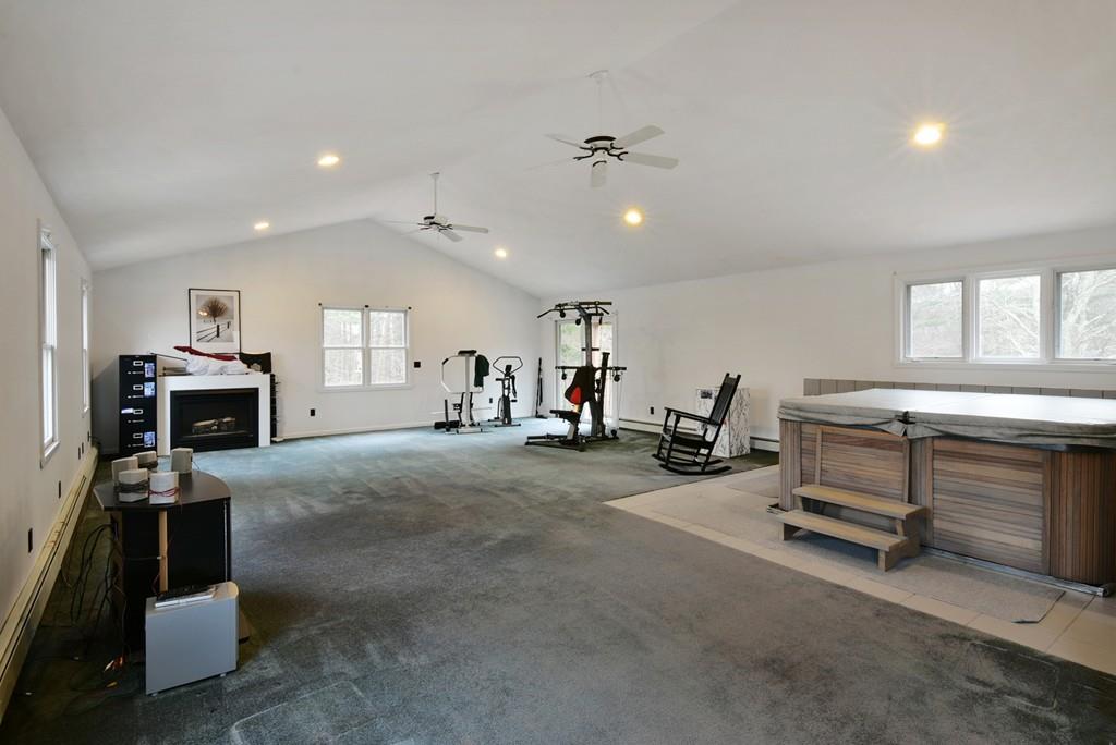 751 Fowler Road Northbridge, MA 01534 - Photo 16 of 32 a living room with furniture and a flat screen tv