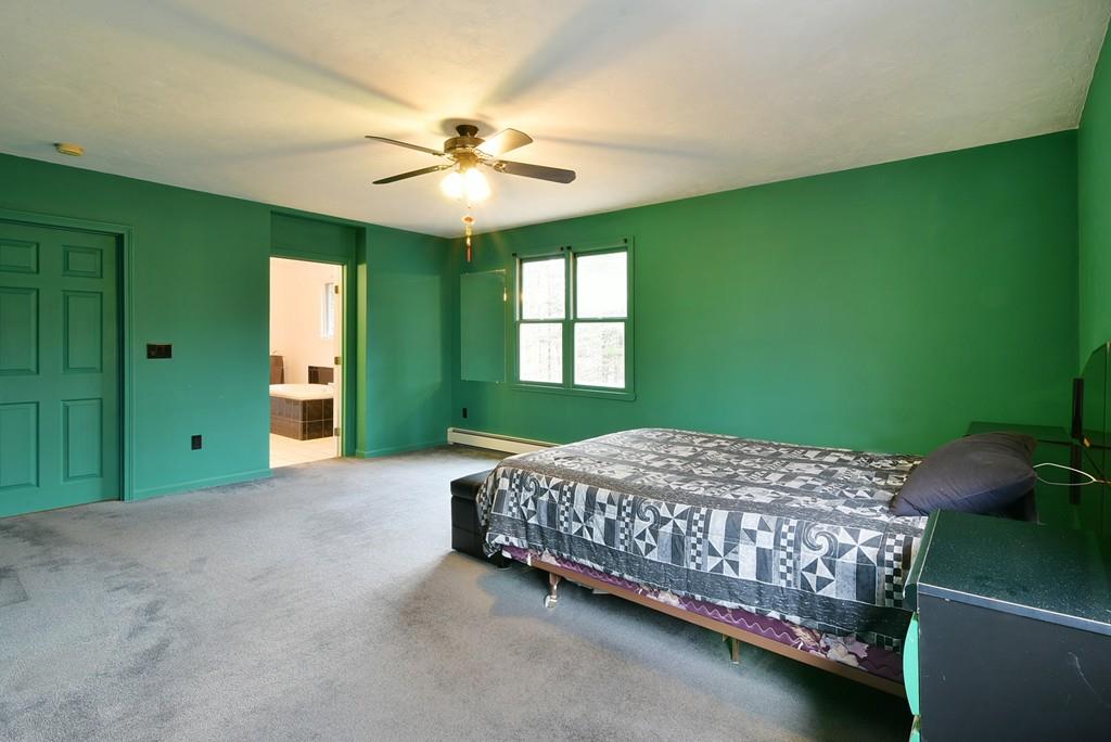751 Fowler Road Northbridge, MA 01534 - Photo 20 of 32 a bedroom with a bed and a window