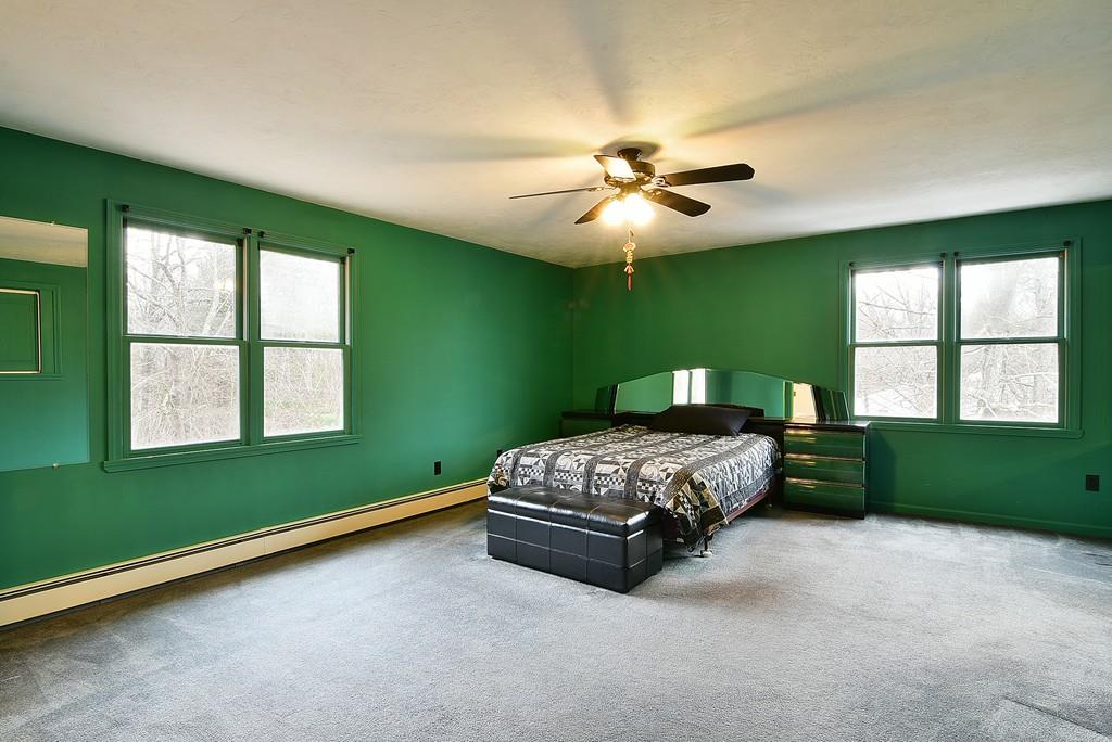 751 Fowler Road Northbridge, MA 01534 - Photo 22 of 32 a bedroom with a bed and a window