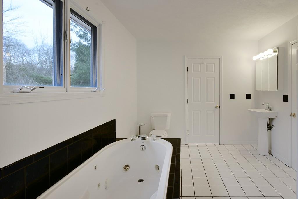 751 Fowler Road Northbridge, MA 01534 - Photo 26 of 32 a bathroom with a bathtub and shower