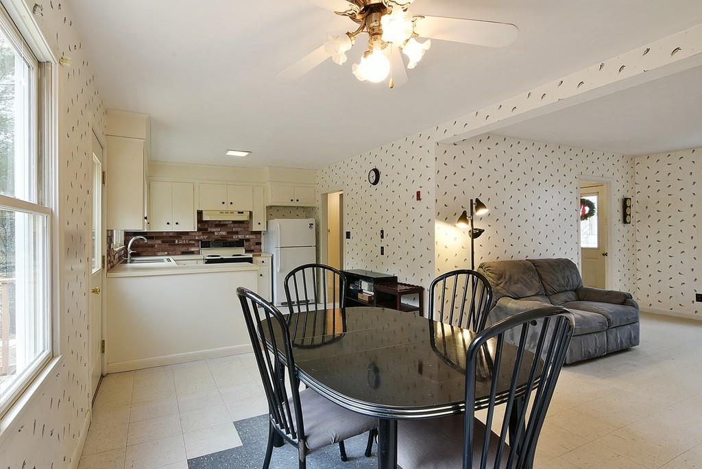 751 Fowler Road Northbridge, MA 01534 - Photo 7 of 32 a dinning area with furniture and chandelier