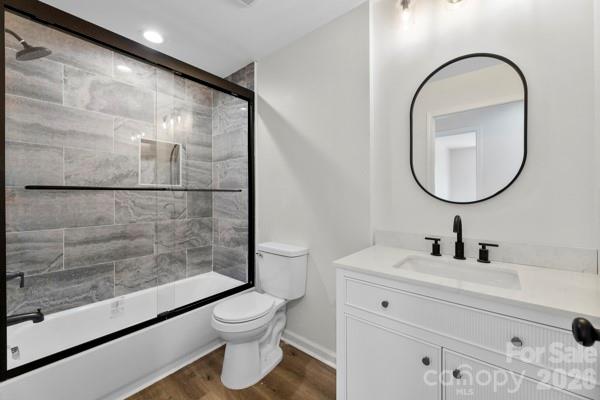 808 3rd Street Kings Mountain, NC 28086 - Photo 16 of 24 a bathroom with a toilet sink and a mirror
