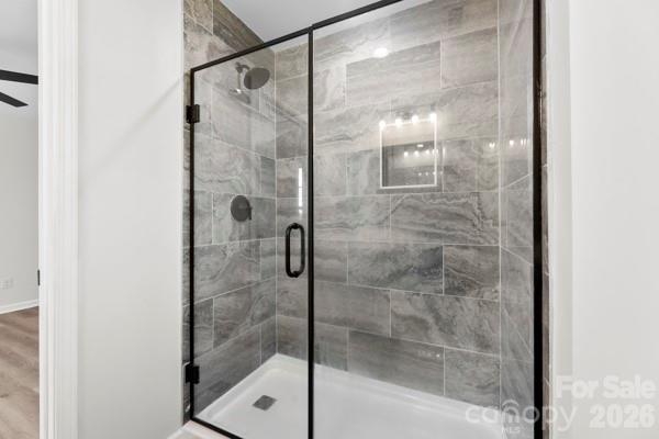 808 3rd Street Kings Mountain, NC 28086 - Photo 17 of 24 a bathroom with a glass shower door