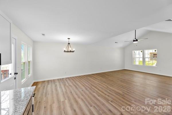 808 3rd Street Kings Mountain, NC 28086 - Photo 8 of 24 wooden floor in an empty room with a window