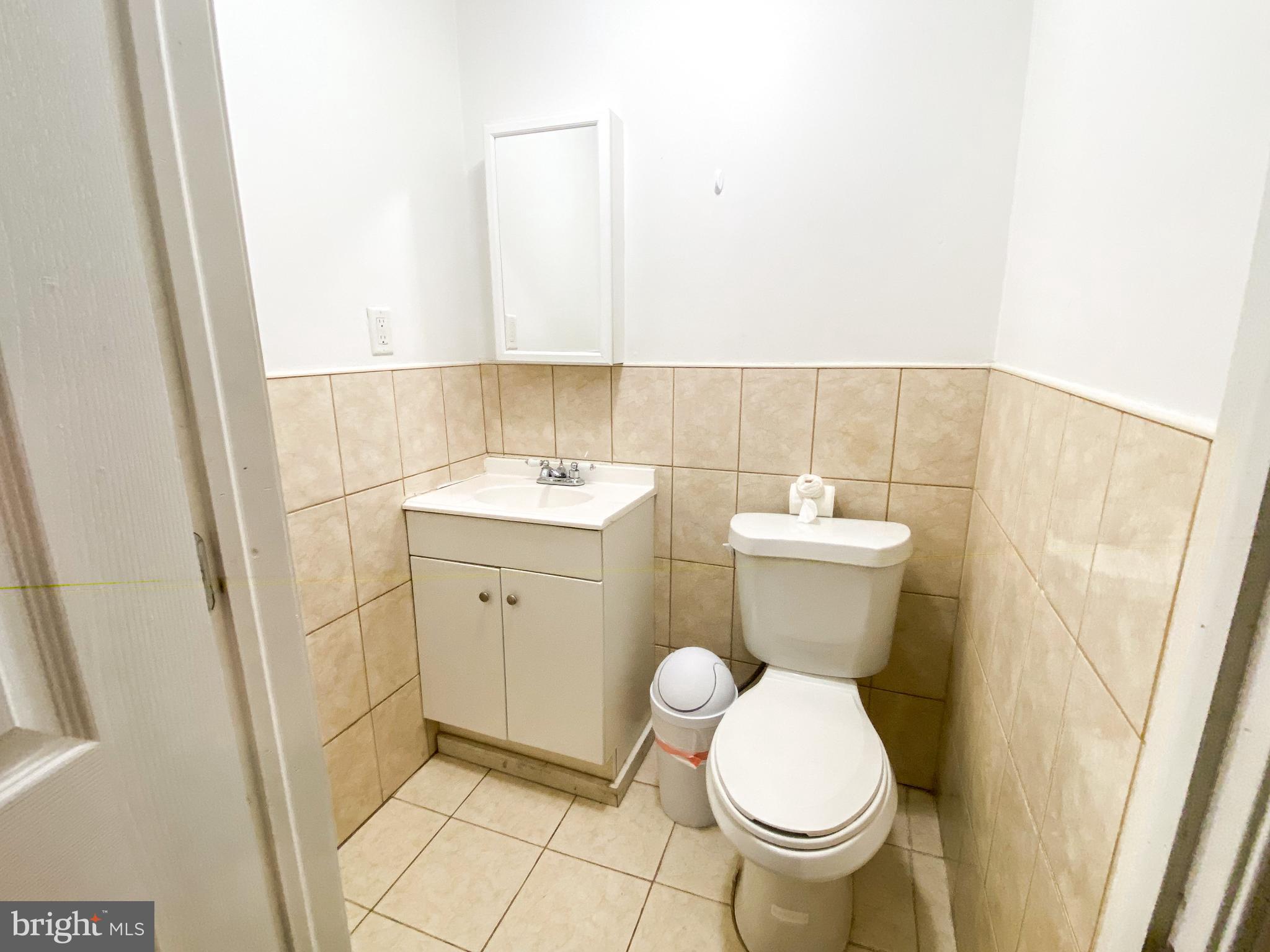174 Master Street Philadelphia, PA 19122 - Photo 5 of 12 a bathroom with a toilet and a sink