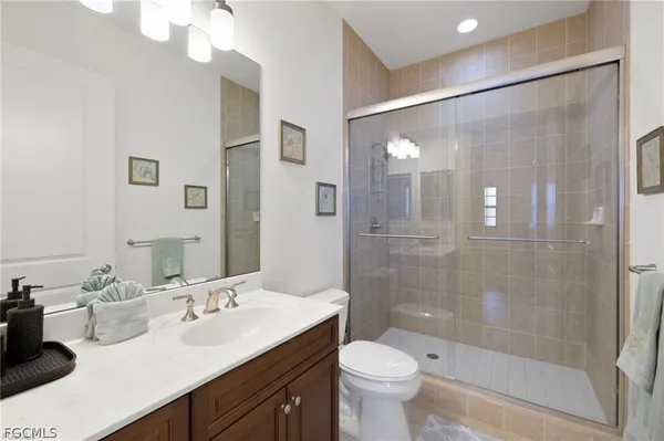 a bedroom with two beds and a window