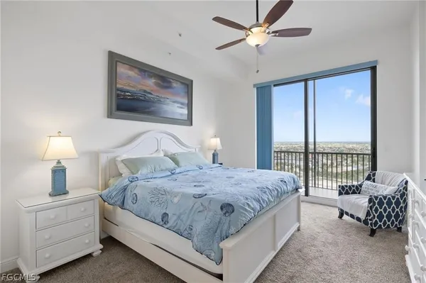 a bathroom with a double vanity sink mirror and shower