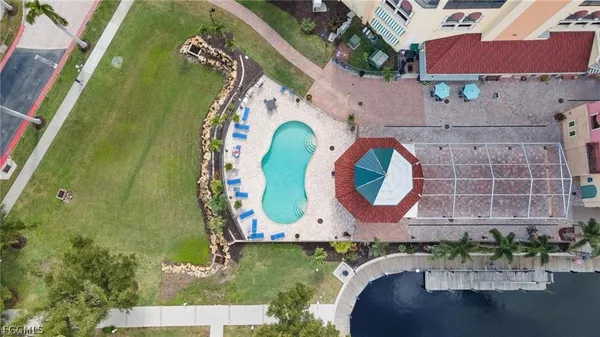 an aerial view of a swimming pool