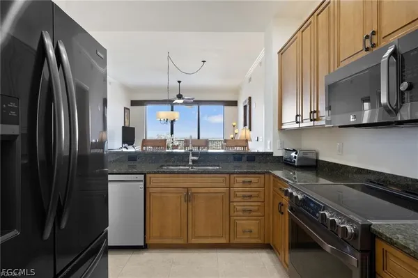 a kitchen with a stove and a microwave